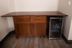 Wet Bar -- natural edge slab top, custom fit, storage and soft closing drawers